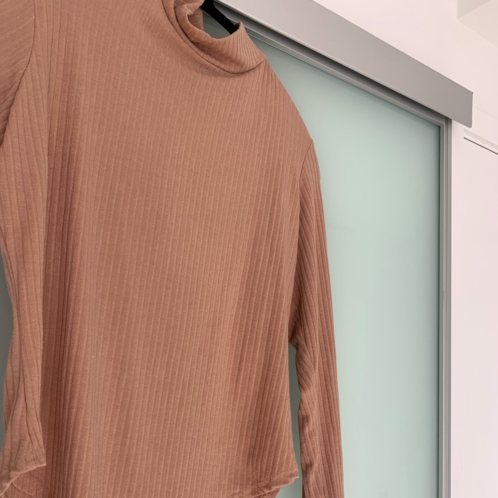 High necked, ribbed long-sleeve body suit in Tan